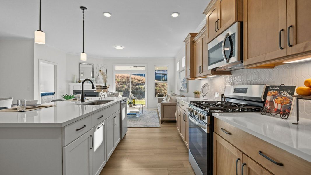 Furnished interior in a model home at Village at Maple Leaf Farm in King (Image 7).