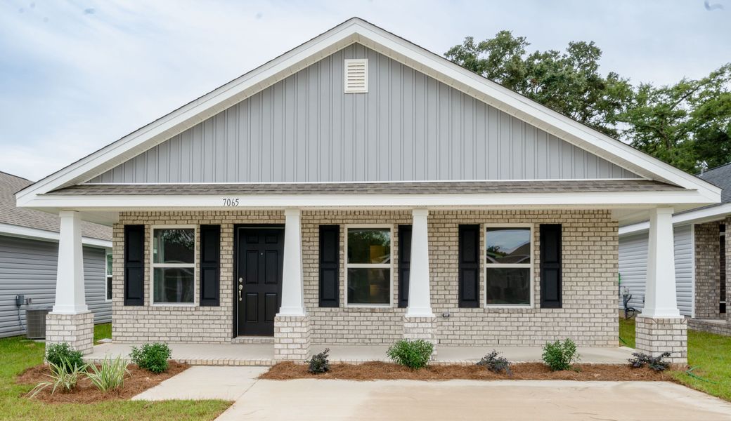 Front exterior of a home in the Westpointe Place community, located in Pensacola, FL (Image 2).