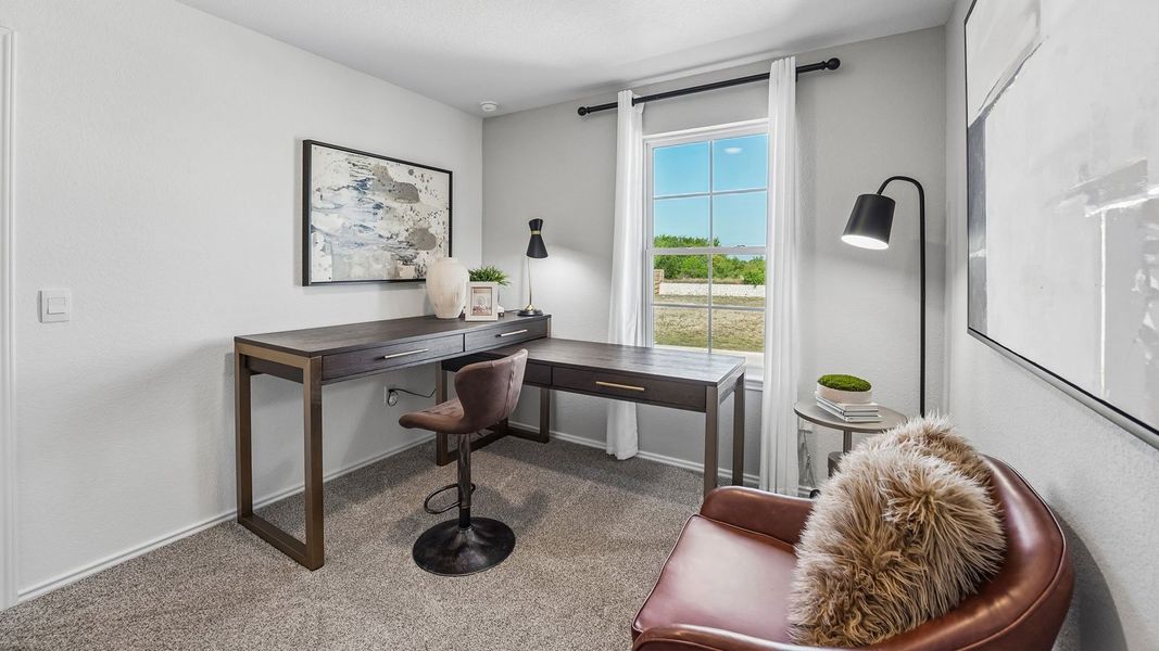 Furnished interior in a model home at Palomino in Manor (Image 33).