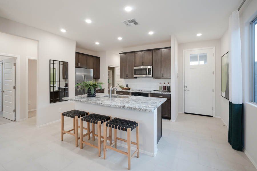 Furnished interior in a model home at Beacon Hill at Marley Park in Surprise (Image 31).