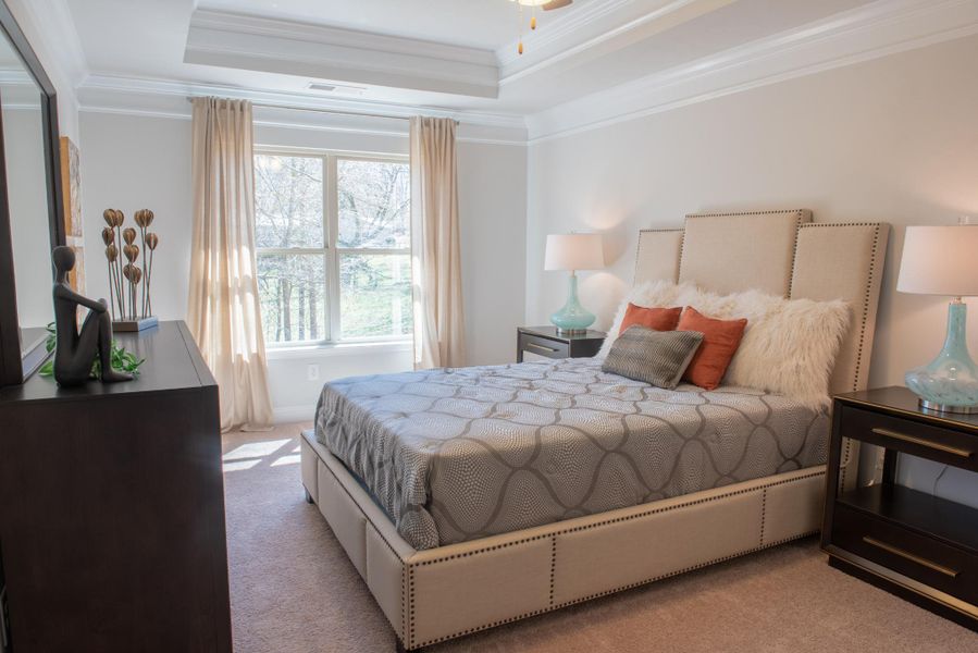 Furnished interior in a model home at Hidden Lake Preserve in Greenville (Image 9).