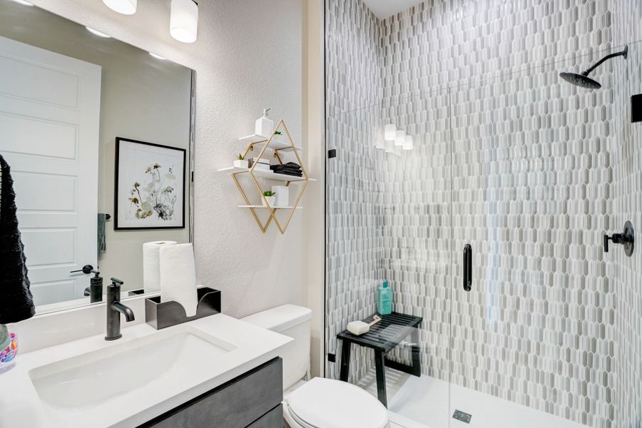 Furnished interior in a model home at Kitchel Lake at Serratoga Falls in Timnath (Image 37).