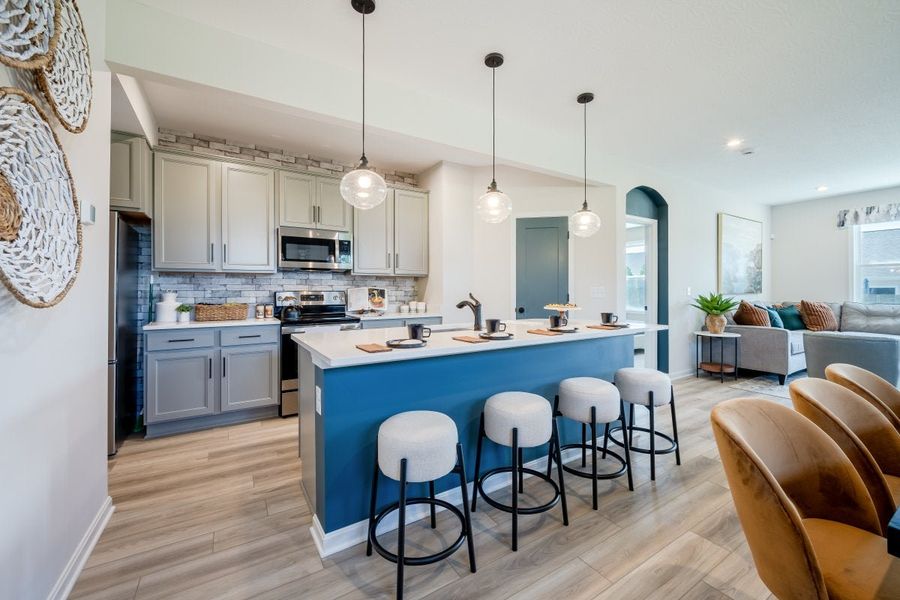 Furnished interior in a model home at Windcrest Farms in Louisville (Image 29).