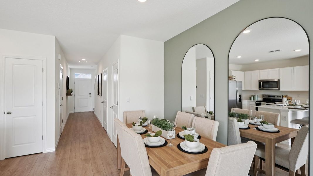 Furnished interior in a model home at Towns at Woodsdale in Wesley Chapel (Image 14).