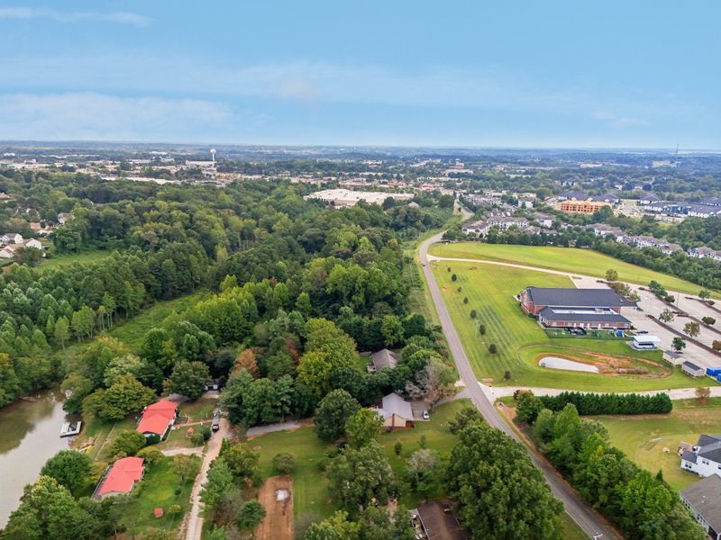 Aerial view of the Trillium Reserve at Lake Norman community in Mooresville, NC, showing layout and nearby surroundings (Image 11). Aerial view of the Trillium Reserve at Lake Norman community in Mooresville, NC, showing layout and nearby surroundings (Image 11).