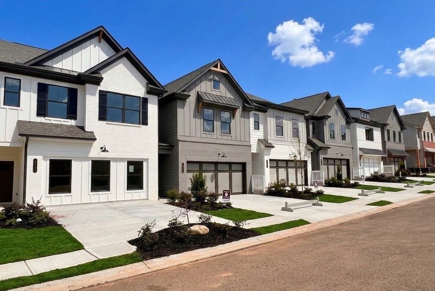 Front exterior of a home in the The Towns at Auburn Station East community, located in Auburn, GA (Image 4).