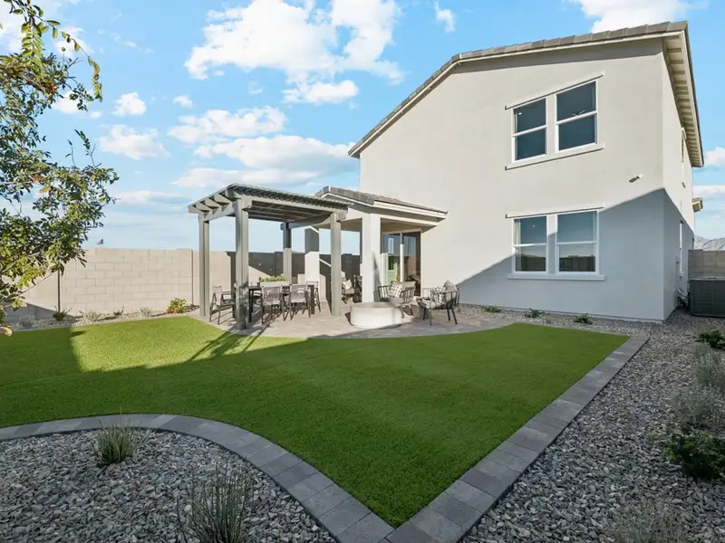 A house with a large front yard.