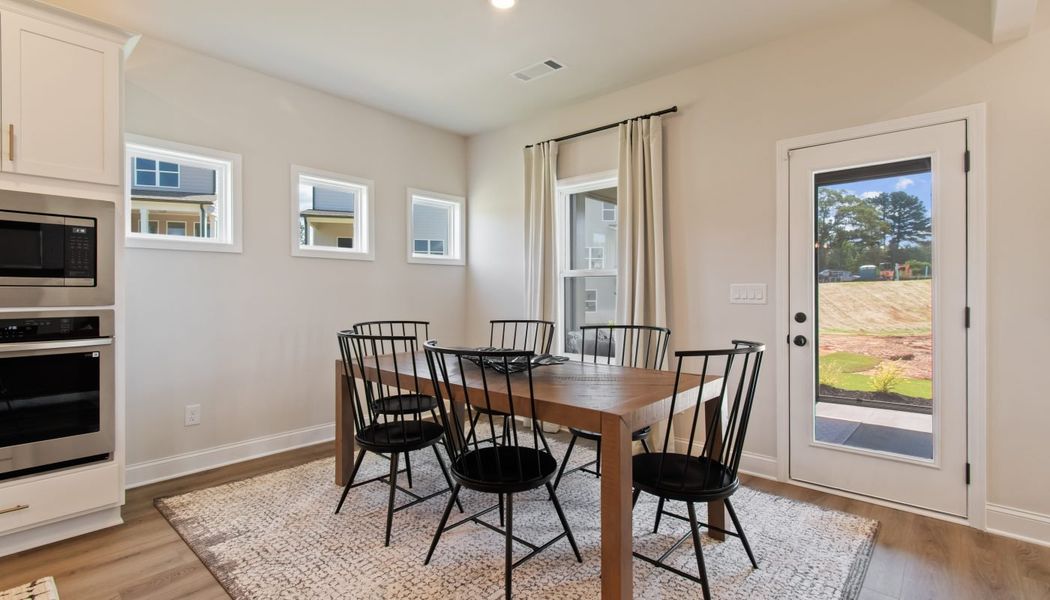 Furnished interior in a model home at Kentmere in Auburn (Image 23).