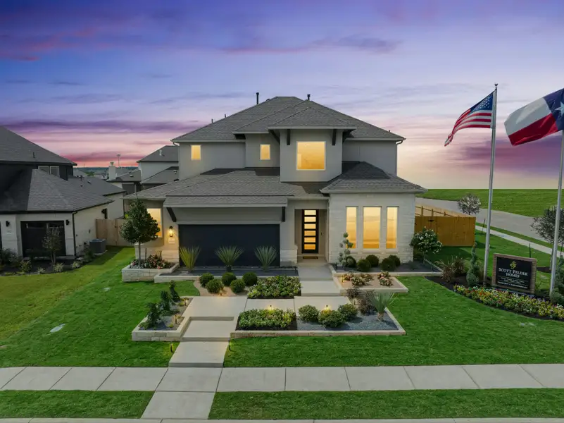 Front exterior of a home in the Blackhawk community, located in Pflugerville, TX (Image 3). Front exterior of a home in the Blackhawk community, located in Pflugerville, TX (Image 3).