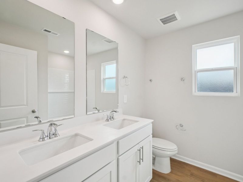 Furnished interior in a model home at Country Lane - Classic Series in Clayton (Image 13).
