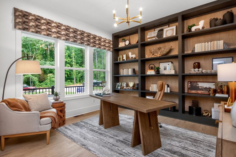 Furnished interior in a model home at Flatiron Forest in Pittsboro (Image 5).