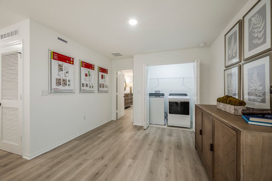 Furnished interior in a model home at Towns at Greenleaf in Oviedo (Image 8).