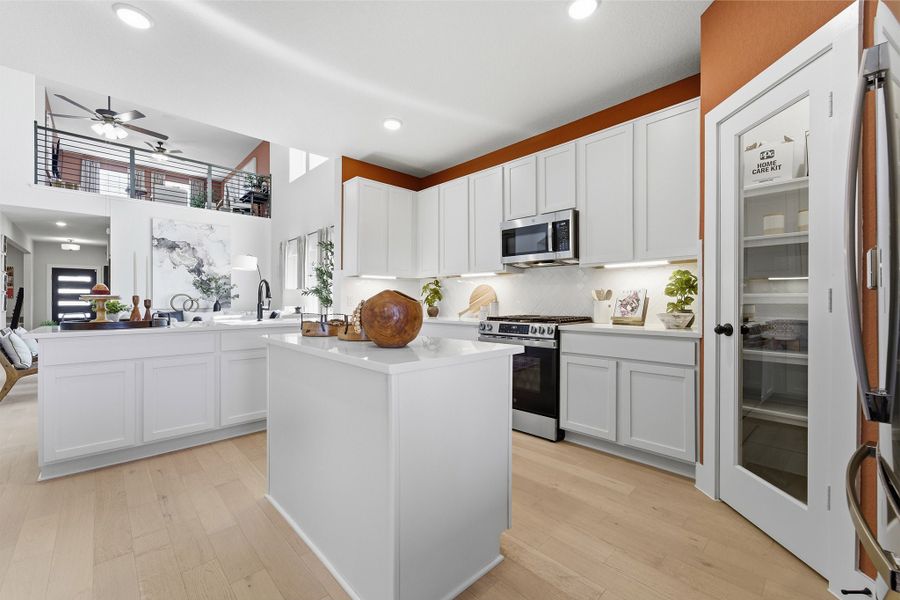 Furnished interior in a model home at Notting Hill in Converse (Image 38).