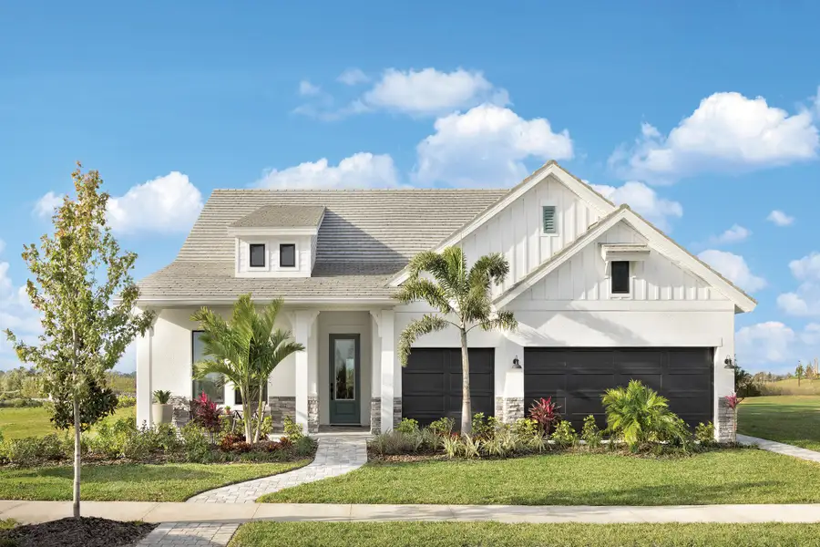 Front exterior of a home in the Palmera Wellen Park - Classic Series community, located in Venice, FL (Image 6).