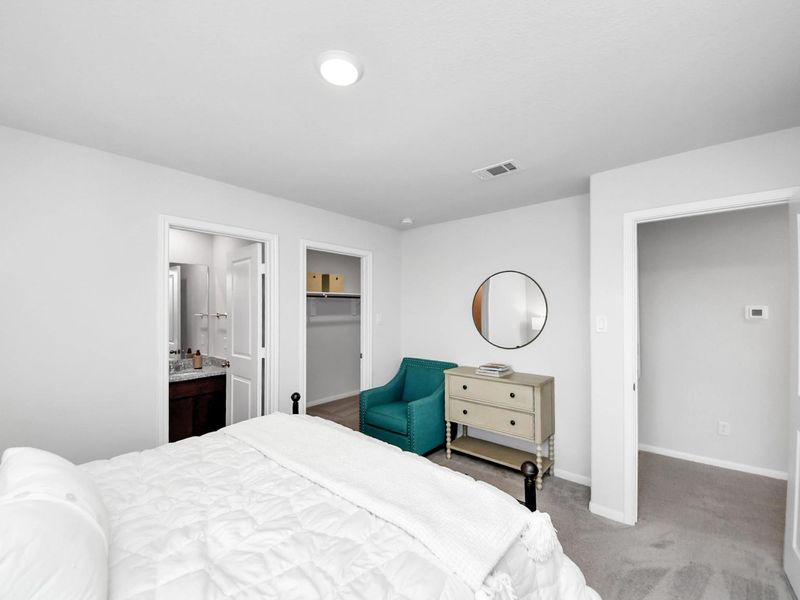 Furnished interior in a model home at Sunterra in Katy (Image 32).