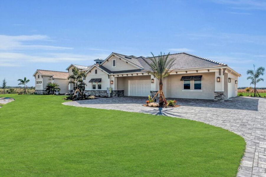 Front exterior of a home in the Hampton Lakes community, located in Sarasota, FL (Image 35). Front exterior of a home in the Hampton Lakes community, located in Sarasota, FL (Image 35).