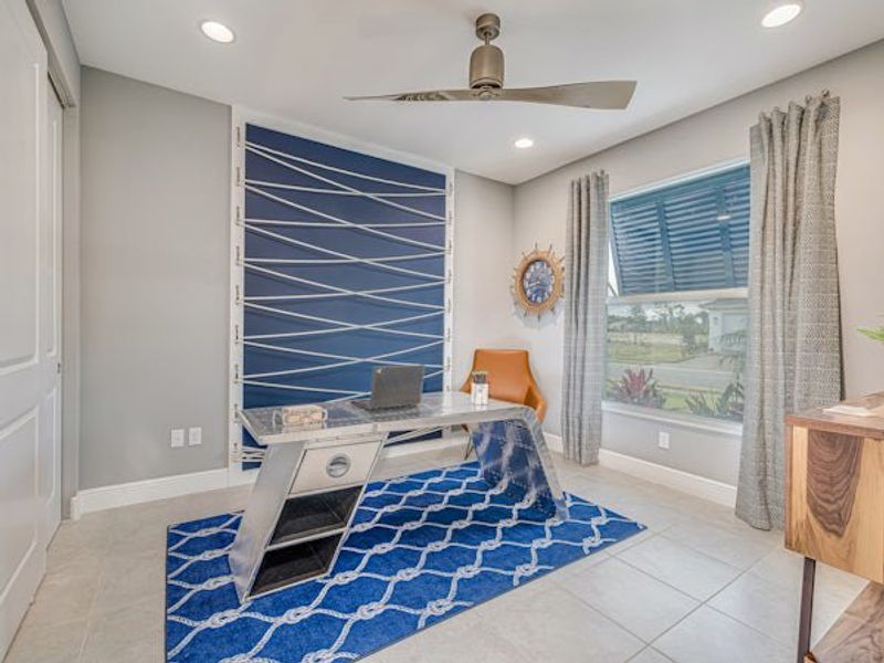 Furnished interior in a model home at High Pointe in Vero Beach (Image 70).