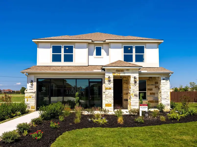 Front exterior of a home in the August Fields community, located in New Braunfels, TX (Image 3). Front exterior of a home in the August Fields community, located in New Braunfels, TX (Image 3).