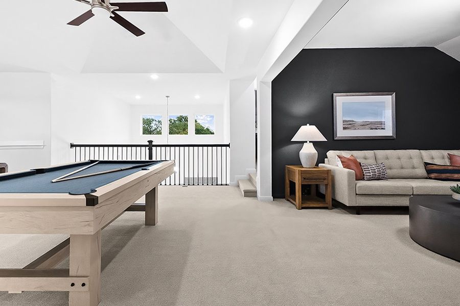 Furnished interior in a model home at The Reserve at Spiritas Ranch in Little Elm (Image 16).