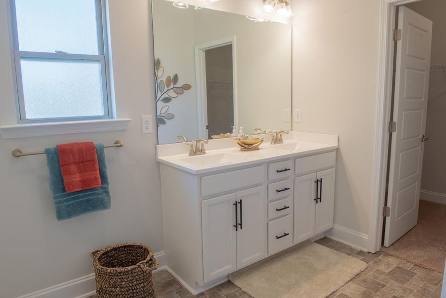 Furnished interior in a model home at Hidden Lake Preserve in Greenville (Image 10).