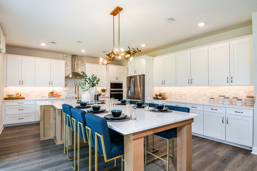 Furnished interior in a model home at Vintner Reserve in Clermont (Image 5).