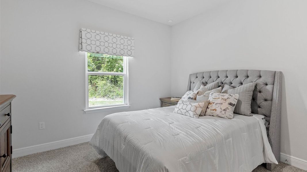 Furnished interior in a model home at Pine Dove Estates in Tallahassee (Image 24).