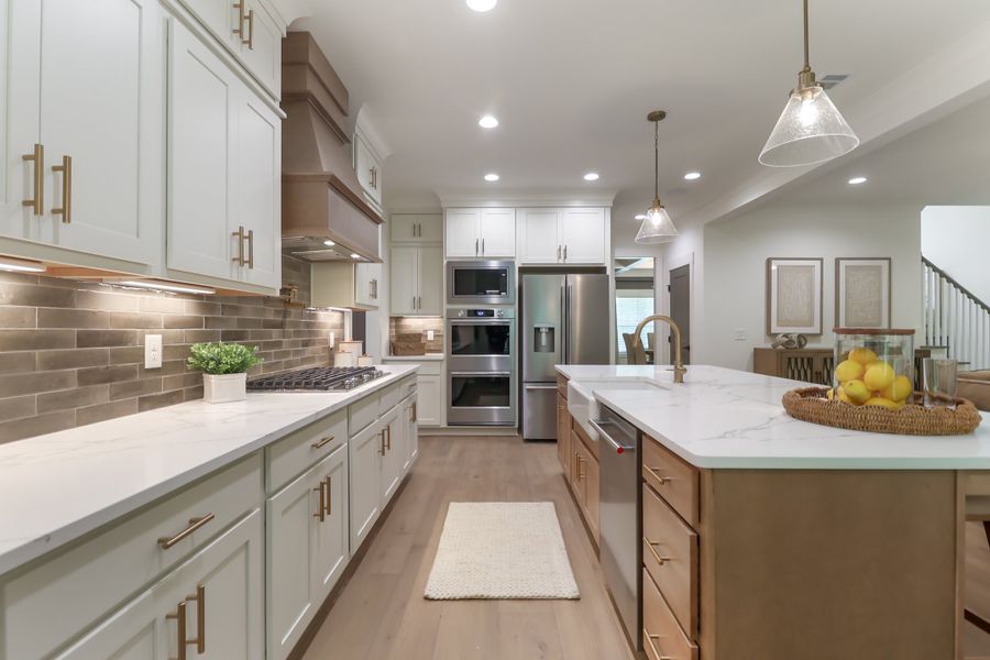Furnished interior in a model home at St. Regis in Oxford (Image 7).