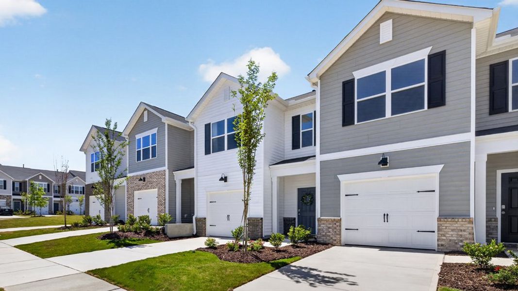 Front exterior of a home in the The Townes at Galvins Ridge community, located in Sanford, NC (Image 13). Front exterior of a home in the The Townes at Galvins Ridge community, located in Sanford, NC (Image 13).
