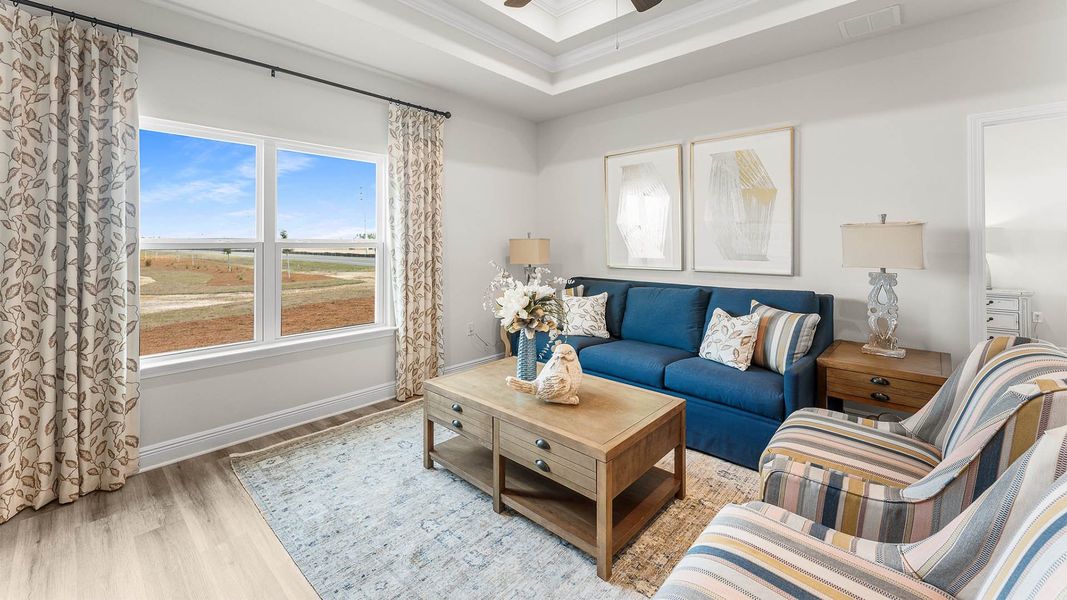 Furnished interior in a model home at Titus Park in Panama City (Image 8).