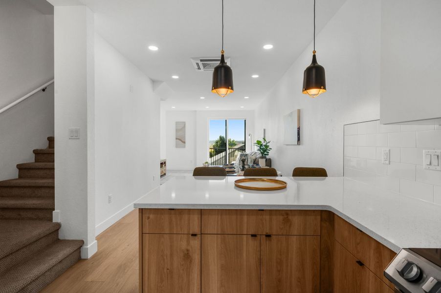 Furnished interior in a model home at Sloan's View Townhomes in Denver (Image 12). Furnished interior in a model home at Sloan's View Townhomes in Denver (Image 12).