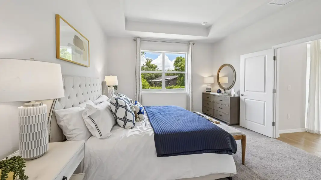 Furnished interior in a model home at Gladstone Park Villas in Sarasota (Image 20).
