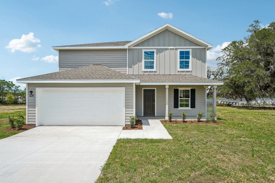 A house with a garage. A house with a garage.