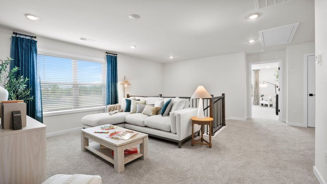 Furnished interior in a model home at Sycamore Cove in Woodruff (Image 60).