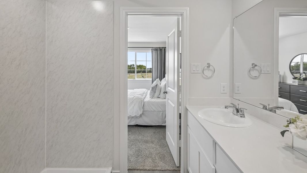 Furnished interior in a model home at Stonewood in Sulphur Springs (Image 31).