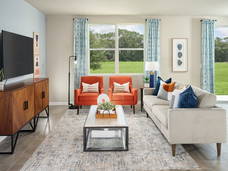 Furnished interior in a model home at The Reserve at Van Oaks in Auburndale (Image 5).
