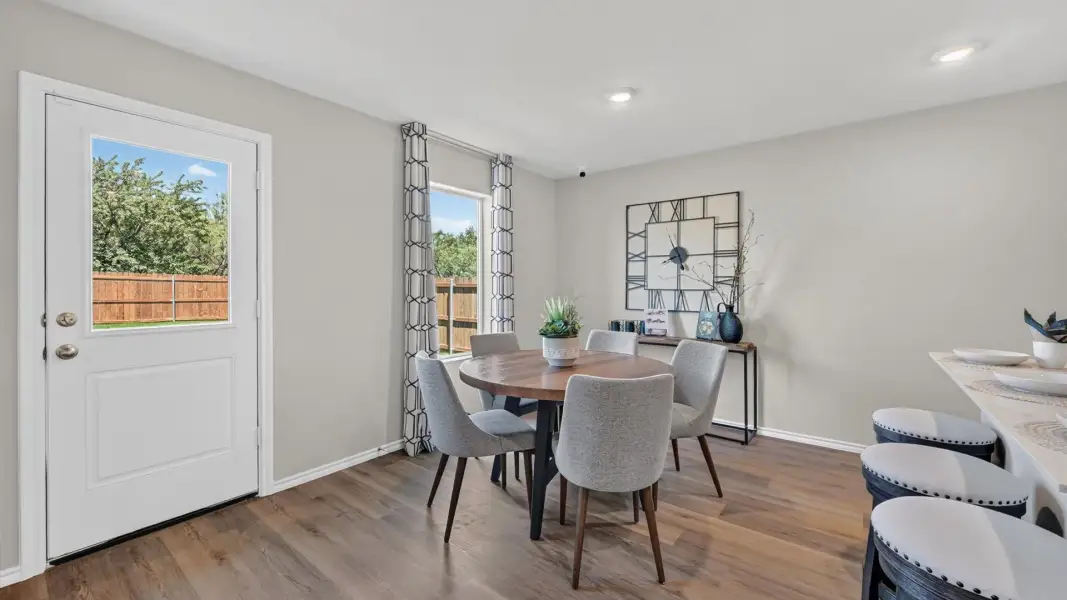 Furnished interior in a model home at The Wells in Mineral Wells (Image 8).