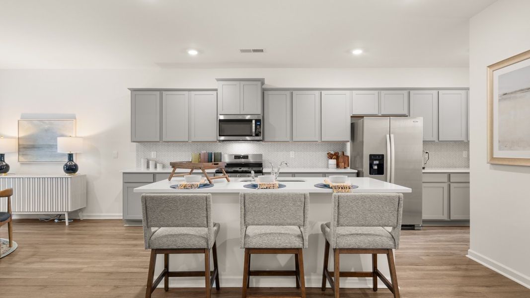 Furnished interior in a model home at Bridle Creek in Locust Grove (Image 6). Furnished interior in a model home at Bridle Creek in Locust Grove (Image 6).