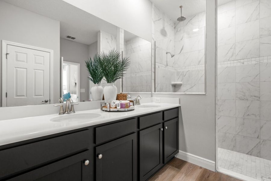 Furnished interior in a model home at The Lakes at St. Sebastian Preserve in Sebastian (Image 7).