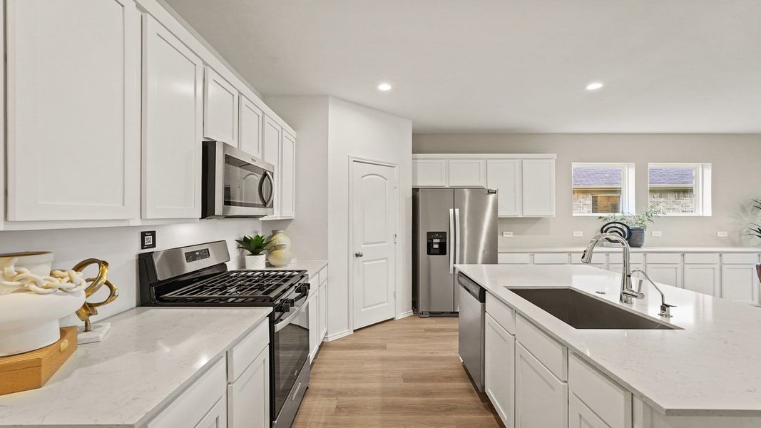 Furnished interior in a model home at Newport Pointe in Crosby (Image 17).