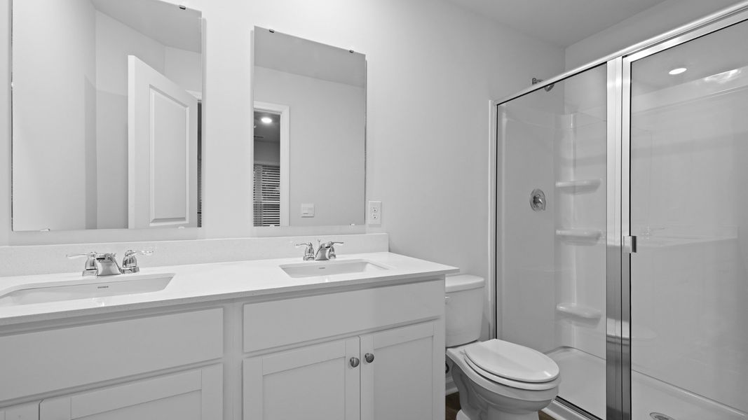 Furnished interior in a model home at Garbon Fields in Summerville (Image 17).