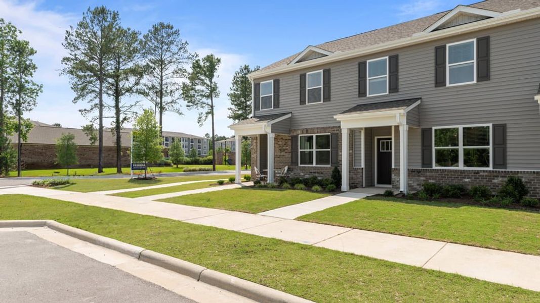 Front exterior of a home in the Clock Road Townhomes community, located in New Bern, NC (Image 2).