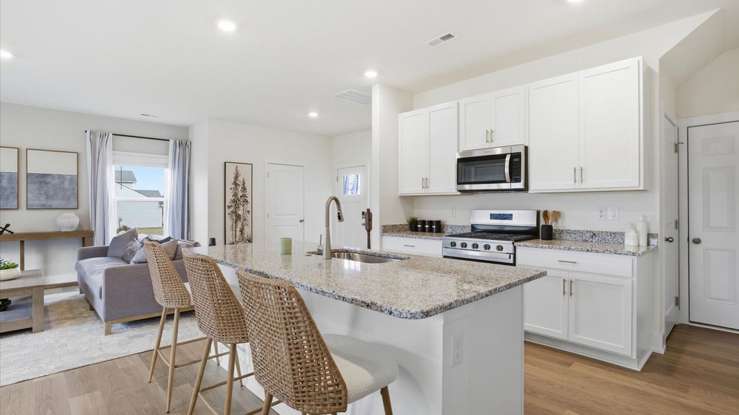 Furnished interior in a model home at Price's Point in Knoxville (Image 8).