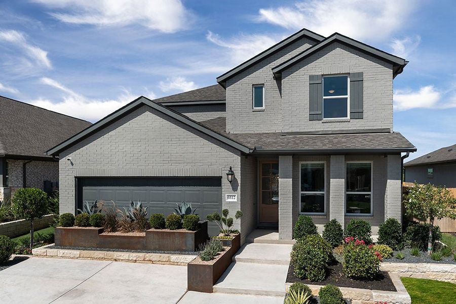 Front exterior of a home in the Turners Crossing community, located in Austin, TX (Image 2). Front exterior of a home in the Turners Crossing community, located in Austin, TX (Image 2).