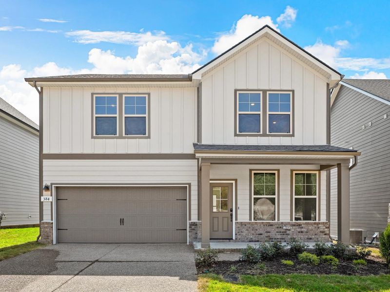 Front exterior of a home in the Woods Crossing community, located in Gallatin, TN (Image 9).