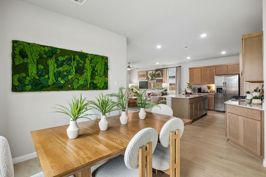 Dining Room in the Oak Model Home by Trophy Signature Homes