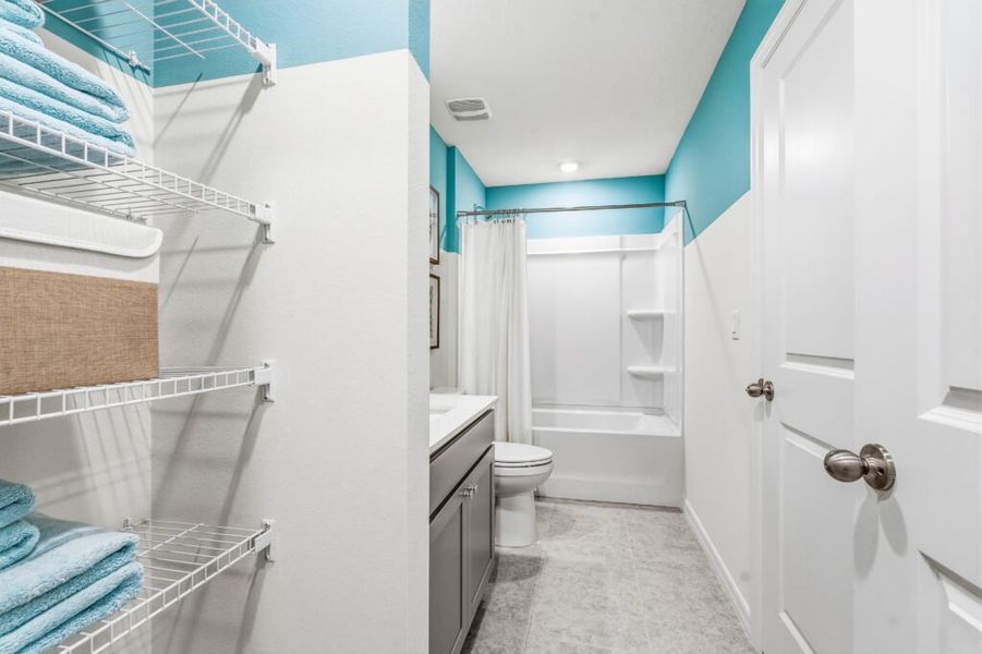 Furnished interior in a model home at Spanish Lakes in Port St. Lucie (Image 23).