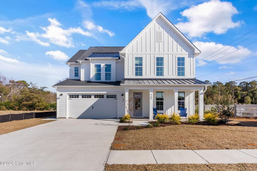 Front exterior of a home in the Windwater community, located in Hampstead, NC (Image 26). Front exterior of a home in the Windwater community, located in Hampstead, NC (Image 26).