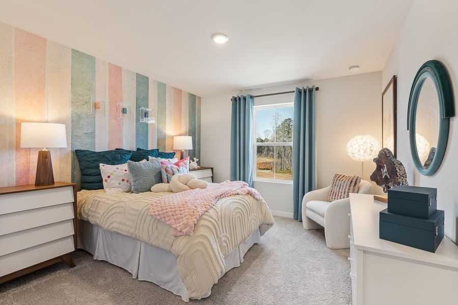 A bedroom with a large mirror. A bedroom with a large mirror.