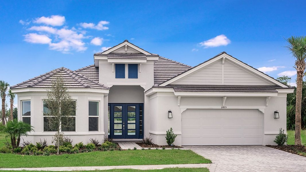 Front exterior of a home in the Esplanade Lake Club community, located in Fort Myers, FL (Image 38).