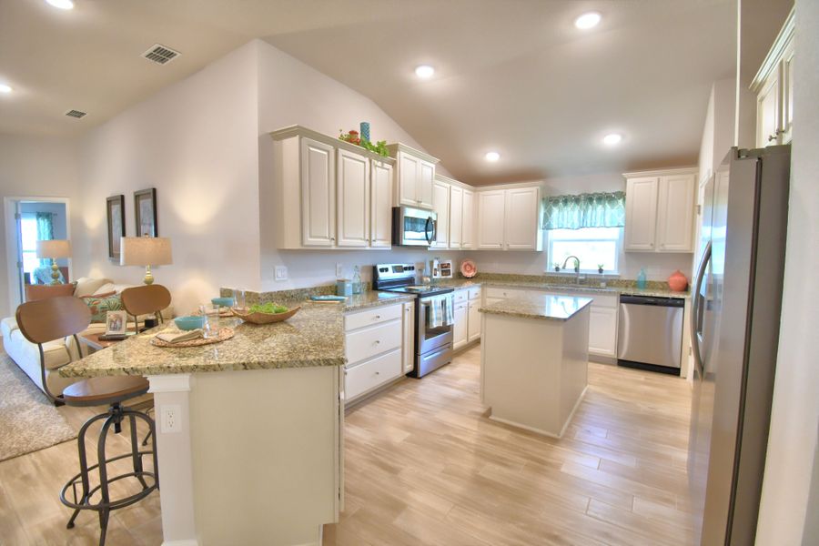 Furnished interior in a model home at Citrus Landing in Davenport (Image 22).